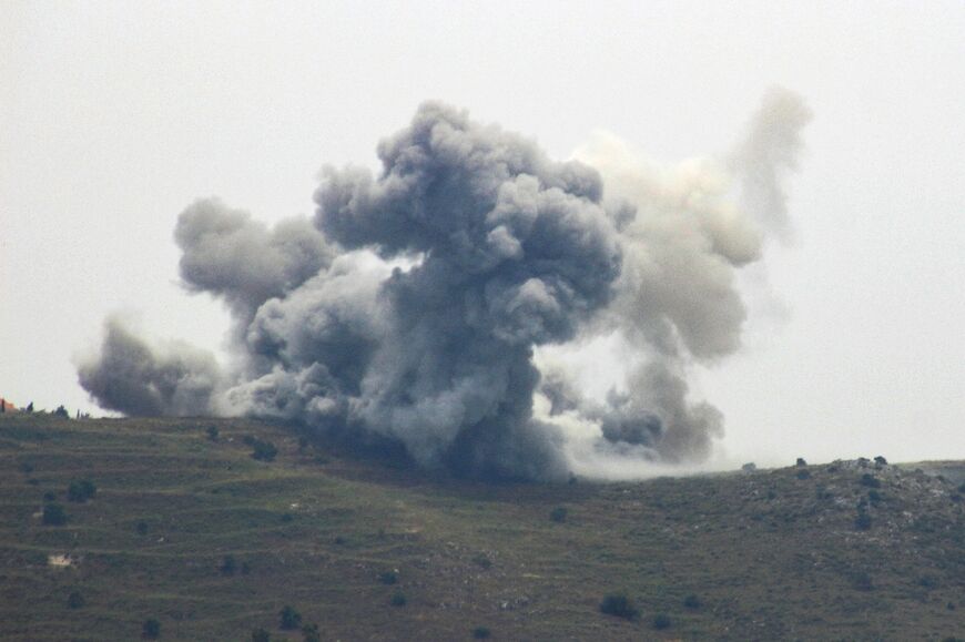 Smoke billows from the site of an Israeli airstrike on the outskirts of the southern Lebanese village of Alma al Shaab near the border on May 22, 2024