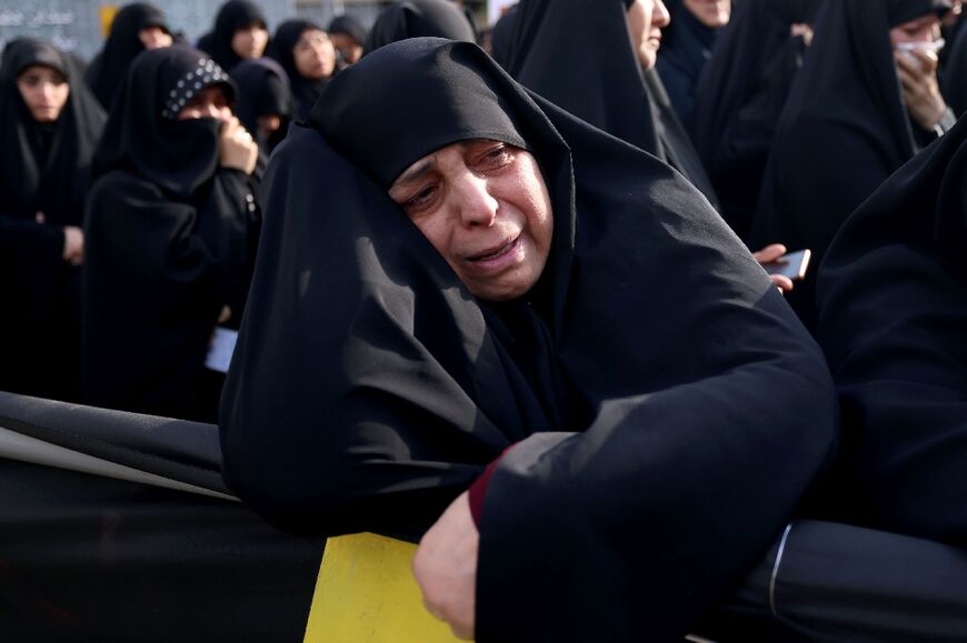 Iranians gather at Valiasr Square in central Tehran to mourn the death of President Ebrahim Raisi and Foreign Minister Hossein Amir-Abdollahian