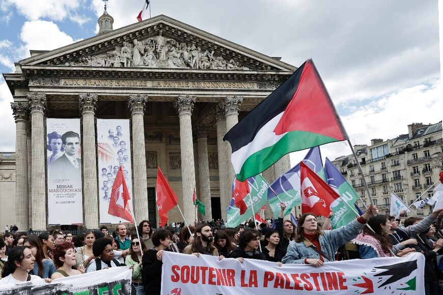 Several hundred people gathered in front of the Pantheon national monument in Paris