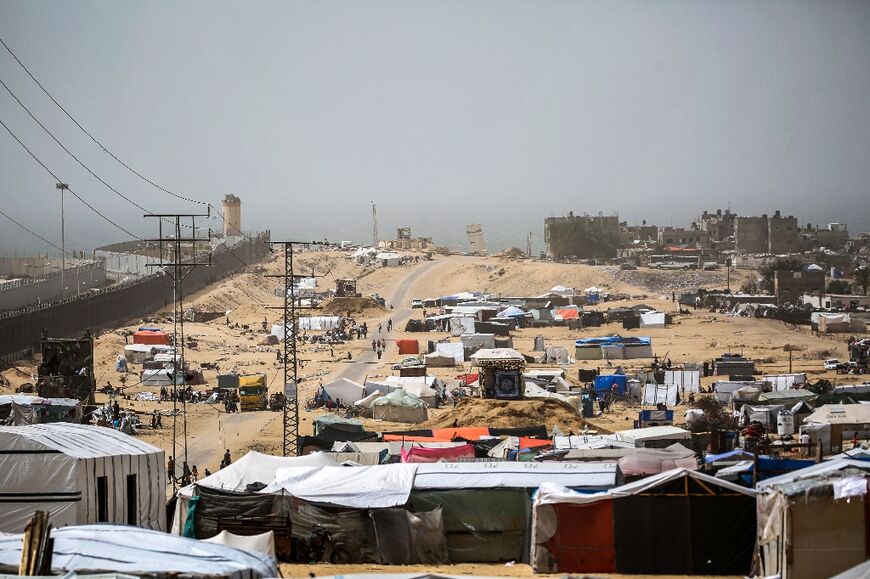 Tents housing displaced Palestinians in Rafah in the southern Gaza Strip near the border fence with Egypt