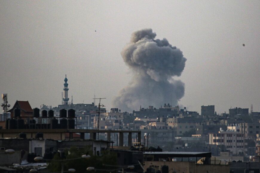 Smoke billows during Israeli bombardment in Rafah in the southern Gaza Strip on May 19, 2024