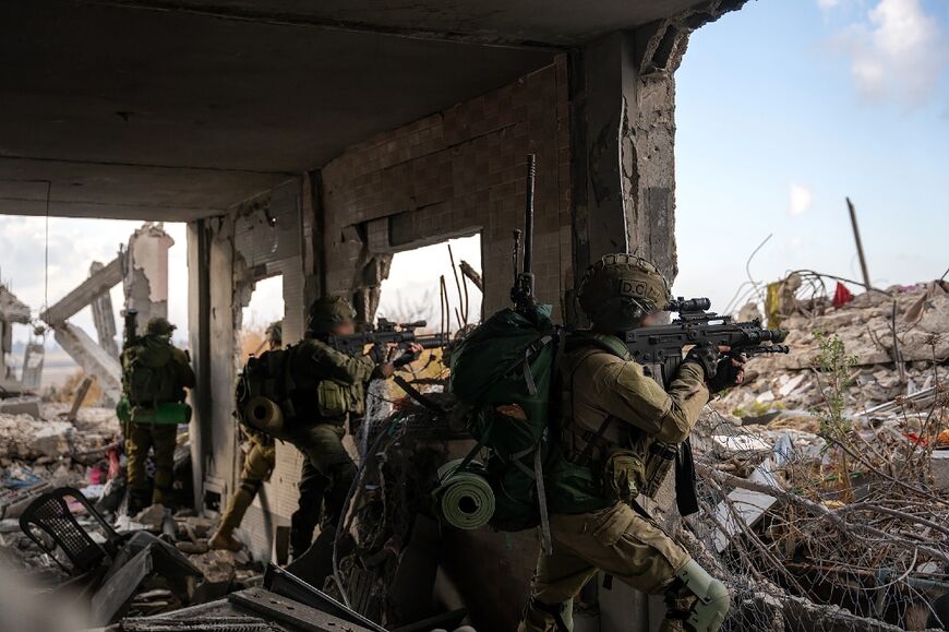 This picture released by the Israeli army on May 14, 2024 shows Israeli soldiers during military operations in the Gaza Strip