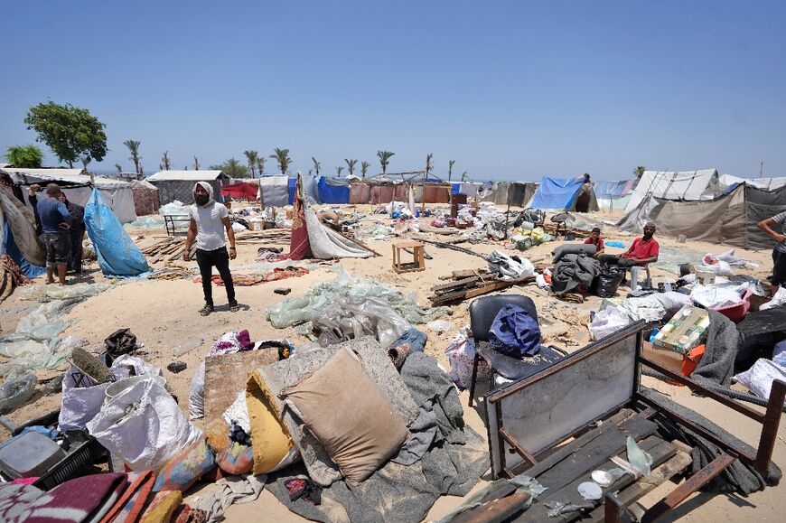 Displaced Palestinians prepare to flee the Al-Mawasi area, near Rafah in southern Gaza -- a UN spokeswoman said living conditions are 'unbearable'