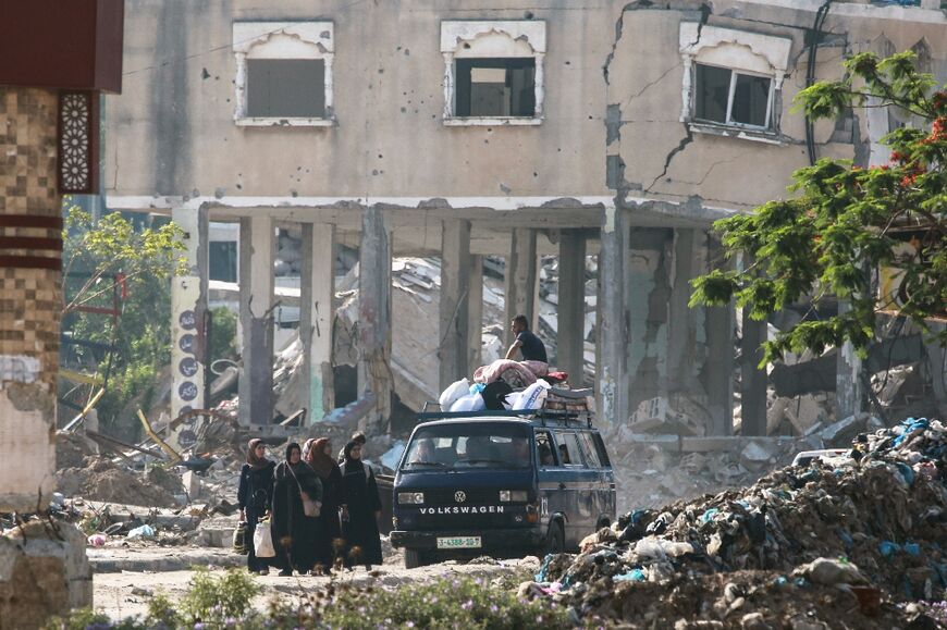 Palestinian civilians flee central Gaza areas near al-Bureij amid Israeli bombardment on June 5, 2024 