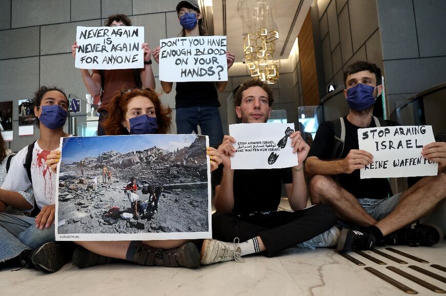 Activists block the entrance to the German embassy in Tel Aviv, calling on Berlin to stop arming Israel