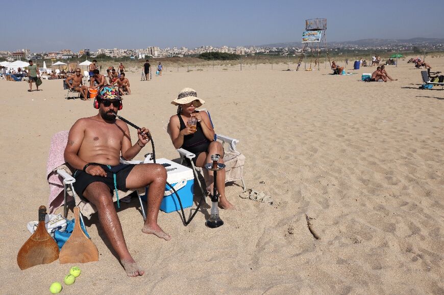 'If you don't go, you'll go mad' one Lebanese beachgoer said, referring to widespread fears  of war with Israel