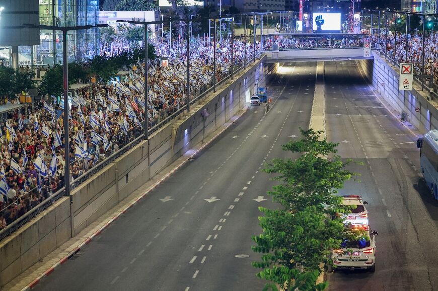 Relatives and supporters of Israelis still held hostage in Gaza demonstrate in Tel Aviv