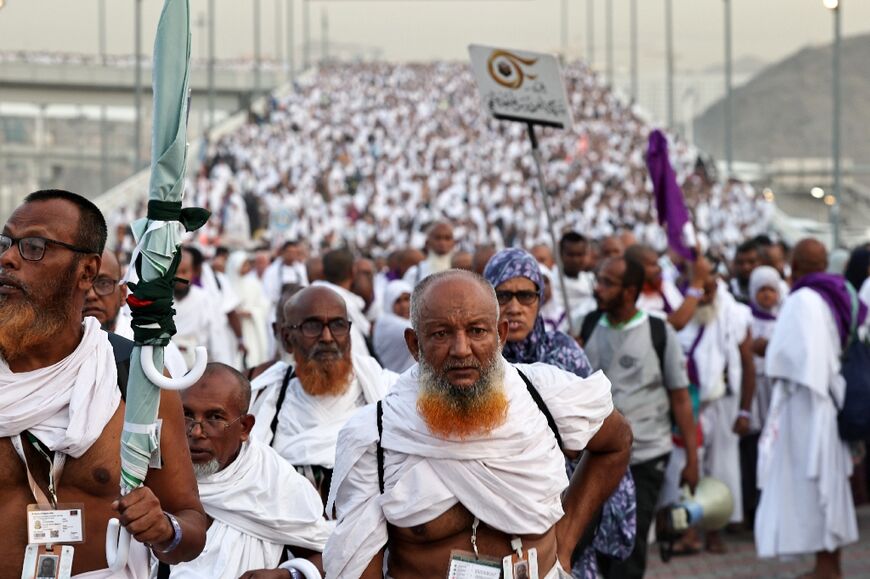 Muslim pilgrims arrive to perform the symbolic stoning of the devil ritual in Mina, near Saudi Arabia's holy city of Mecca