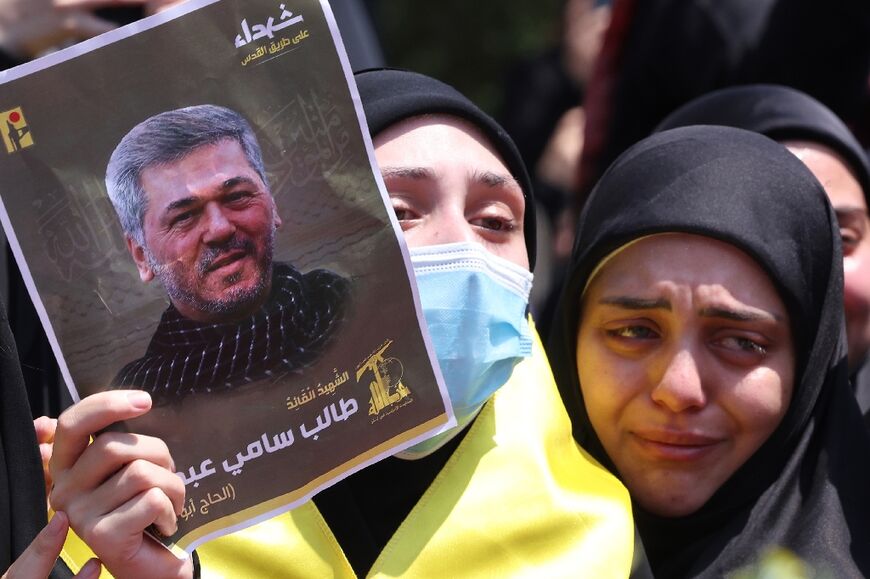 Mourners at the funeral of Taleb Sami Abdallah, Hezbollah commander killed in an Israeli strike