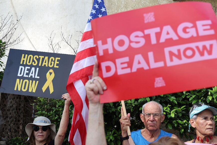 Relatives and supporters of Israelis held hostage in Gaza rally in Tel Aviv during a visit by the US Secretary of State Antony Blinken