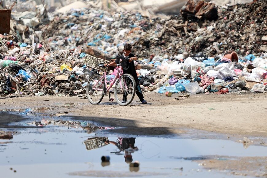 A new study says months of continuous bombing and Israel's fuel blockade has decimated Gaza's outdated waste collection system