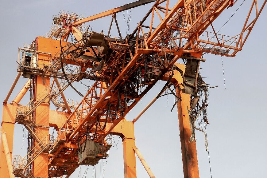 Debris hangs from a damaged crane at Hodeida port, a vital entry point for fuel imports and international aid for rebel-held areas of Yemen