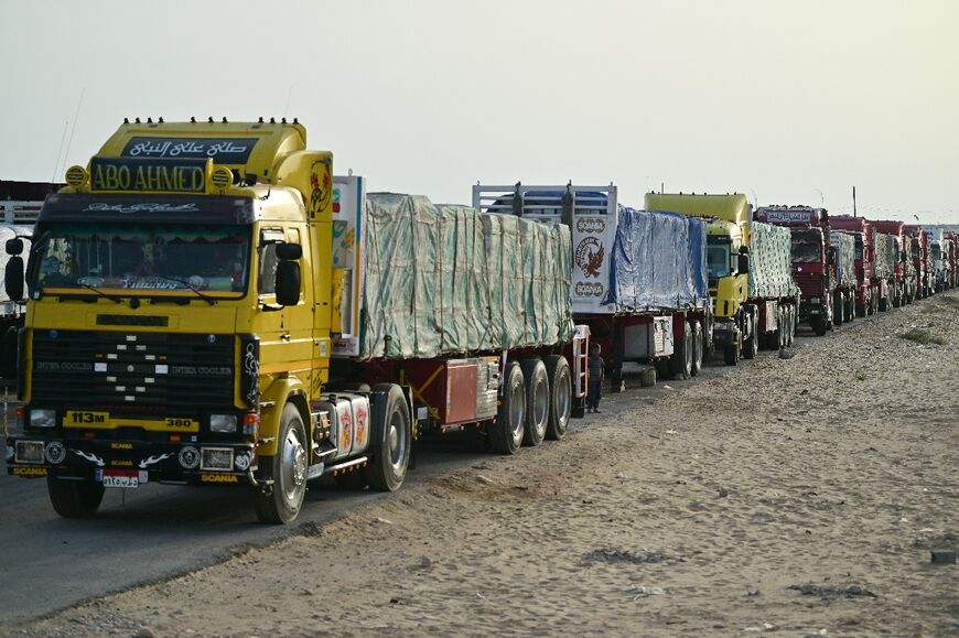 Trucks loaded with humanitarian aid for the Gaza Strip sit on the Egyptian side of the Rafah crossing, closed since early May, 2024 when Israeli troops seized control of the crossing's Palestinian side 