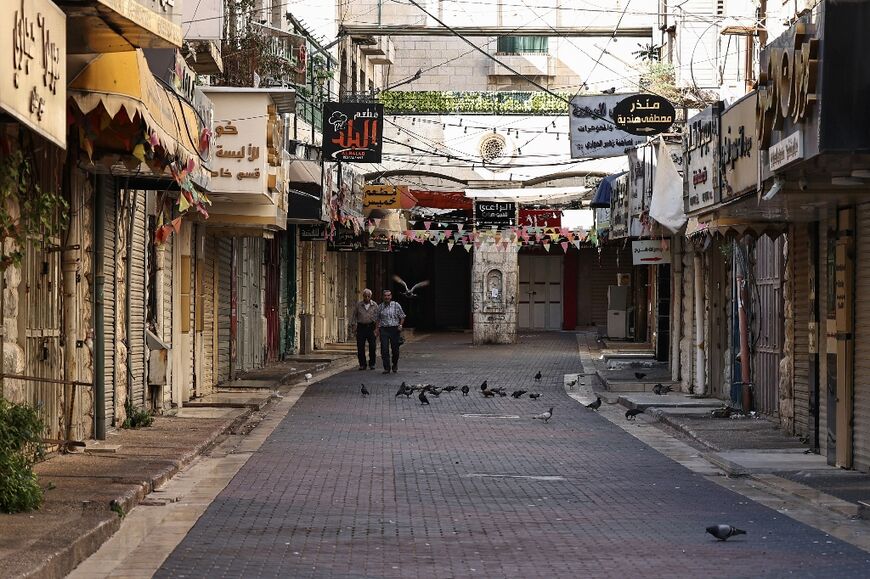 Shops are shuttered in the West Bank city of Nablus as Palestinian observe a general strike in protest at the killing of Hamas leader Isamail Haniyeh in an air strike in Tehran