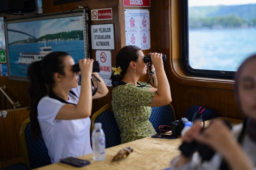 Thar she blows: Istanbulites spotting dolphins on the free cruise designed to raise awareness of the city's resident dolphins