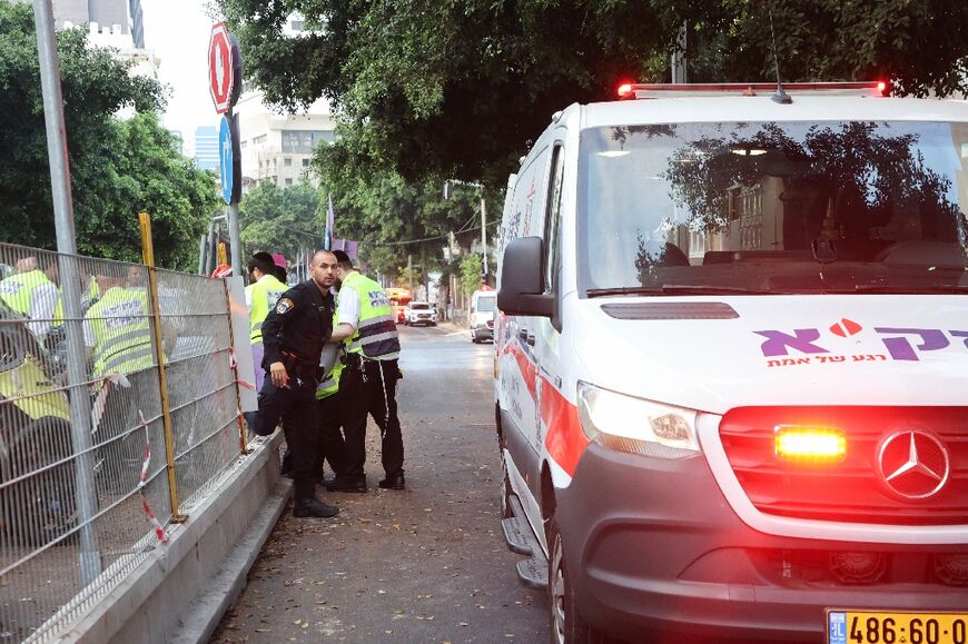 Search and rescue teams recover the body of a person killed in the drone attack on Tel Aviv