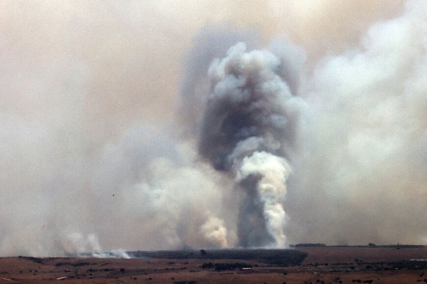 Smoke billows after rockets were fired from southern Lebanon at the Upper Galilee region in northern Israel on July 4, 2024