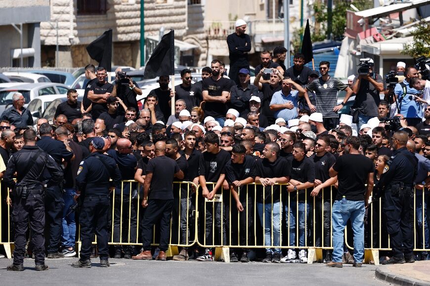 Protesters gathered in Majdal Shams to greet Israeli Prime Minister Benjamin Netanyahu on his visit to the town in the annexed Golan Heights