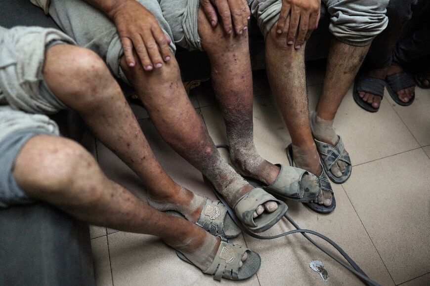 Palestinian men who had been detained by Israel arrive back in Gaza after their release this year