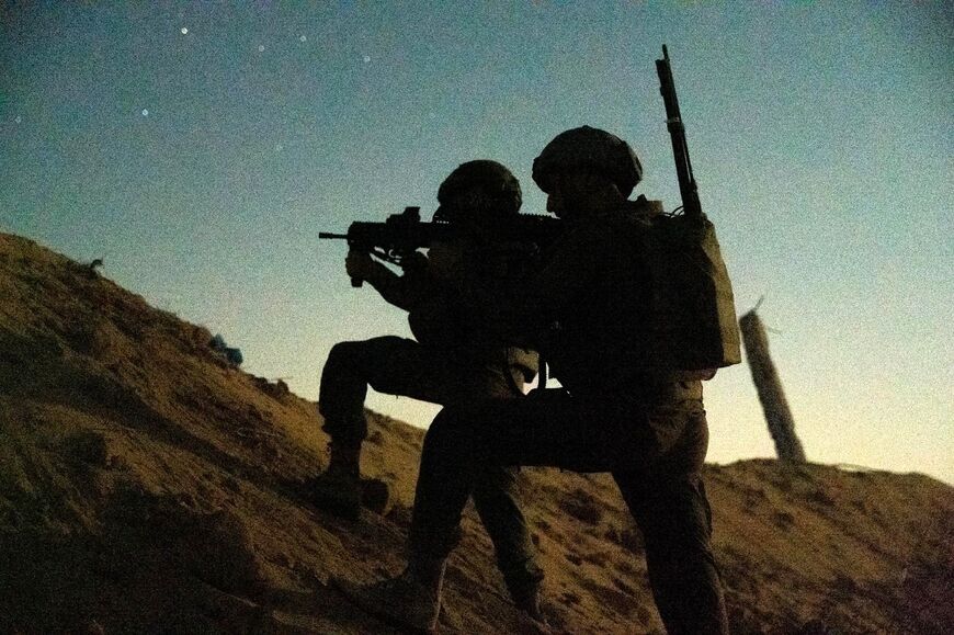 A picture released by the Israeli army on August 23, 2024 shows Israeli forces during an operation the military said was to dismantle a tunnel in Rafah, southern Gaza