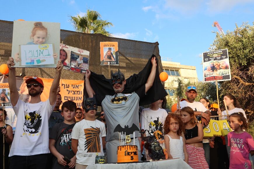 Israelis gather to mark the fifth birthday of Ariel Bibas, held hostage in Gaza, and to call for his liberation