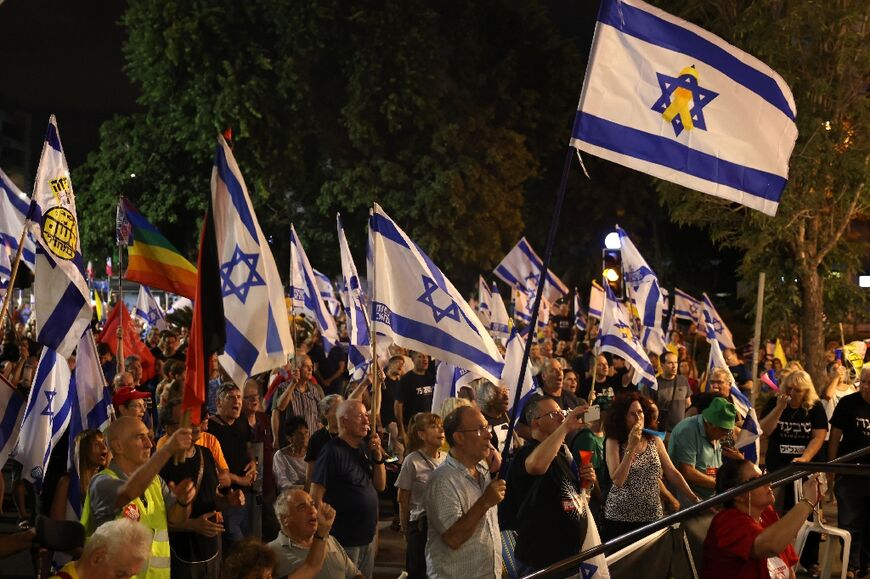 Israelis in the northern port city of Haifa demonstrate in support of a deal that will bring Israeli hostages home