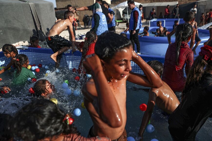 Many of the children have grown up in teh camp and never seen a swimming pool before or learnt how to swim