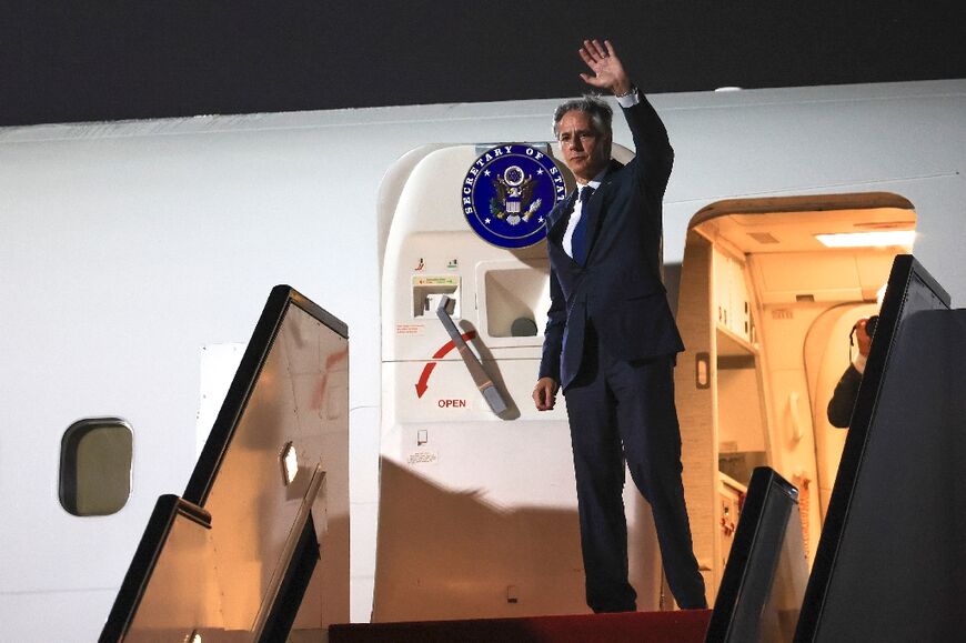 US Secretary of State Antony Blinken waves ahead of his departure from Doha on August 20, 2024
