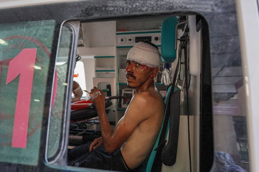 An injured Palestinian in an ambulance at the Nasser hospital following Israeli bombardment of Khan Yunis in the southern Gaza Strip 