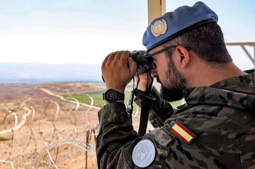 A Spanish member of the United Nations Interim Force in Lebanon (UNIFIL) keeps watch from a base near Khiam, southern Lebanon