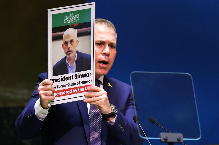 Israeli Ambassador Gilad Erdan holds a picture of Hamas leader Yahya Sinwar during a special session of the United Nations General Assembly