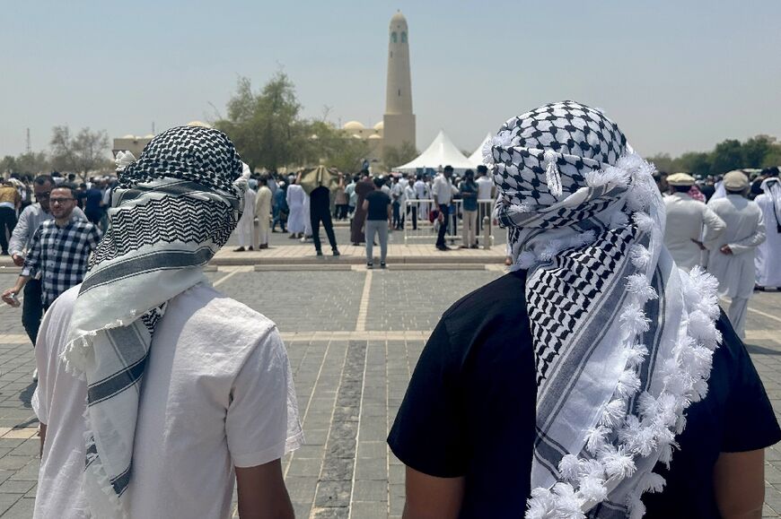 People gather outside Qatar's Imam Muhammad bin Abdul Wahhab Mosque to bid farewell to Hamas leader Ismail Haniyeh