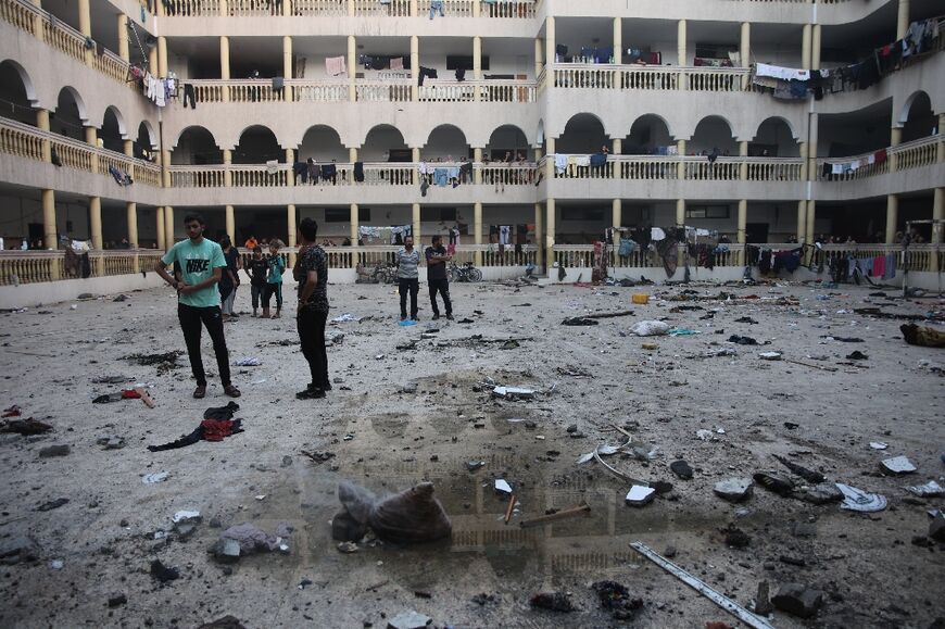 The yard of a school used by displaced Palestinians, after it was hit by an Israeli strike in Gaza City