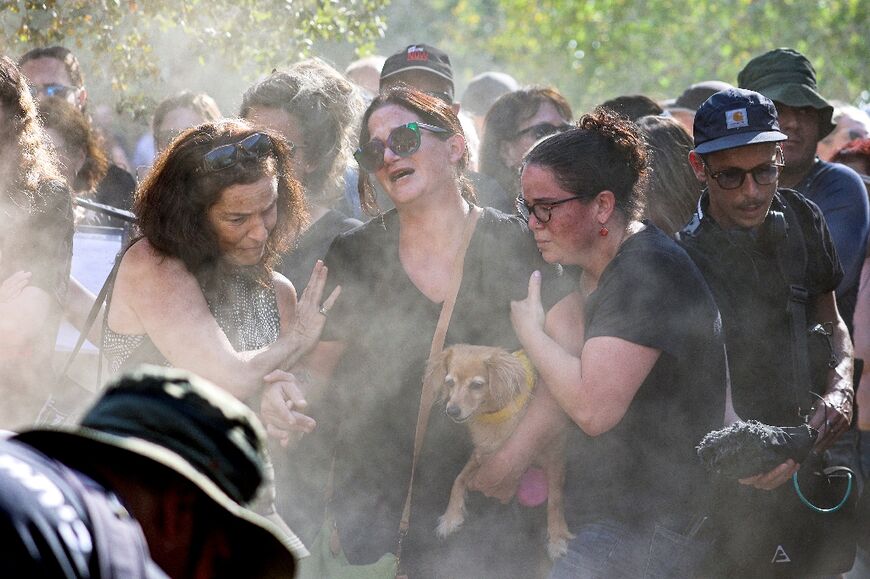 Rimon (C), widow of dead ex-hostage Yagev Buchshtav, at his funeral in southern Israel after his body was recovered from Gaza