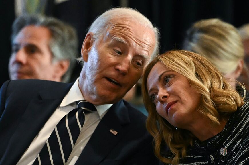 (L-R) US President Joe Biden speaks to Italian Prime Minister Giorgia Meloni as they attend the Global Coalition to Address Synthetic Drug Threats, in New York City on September 24, 2024