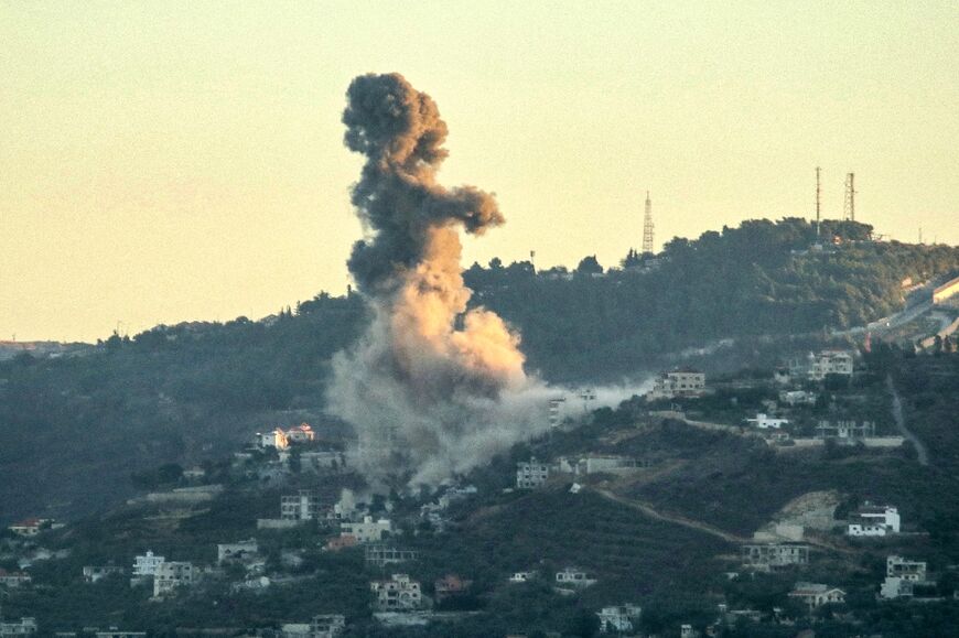 Smoke billows from the site of an Israeli strike that targeted the southern Lebanese village of Odaisseh near the border with Israel on September 18, 2024