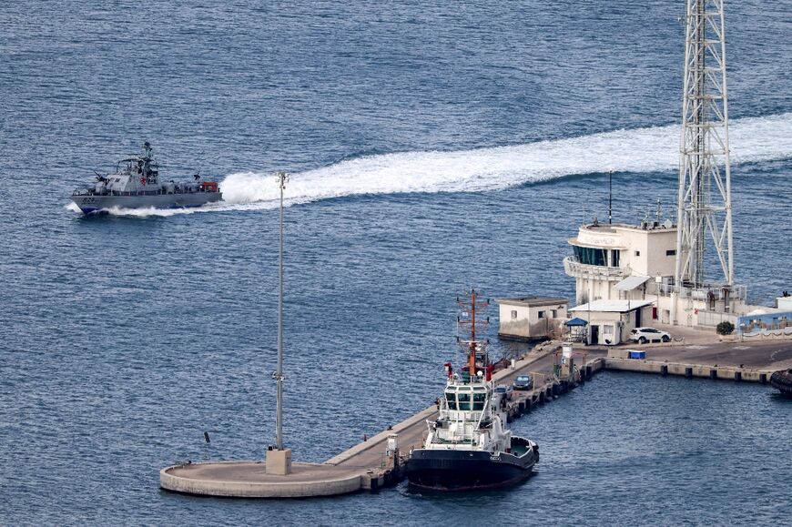 An Israeli navy vessel patrols off the port of the northern city of Haifa