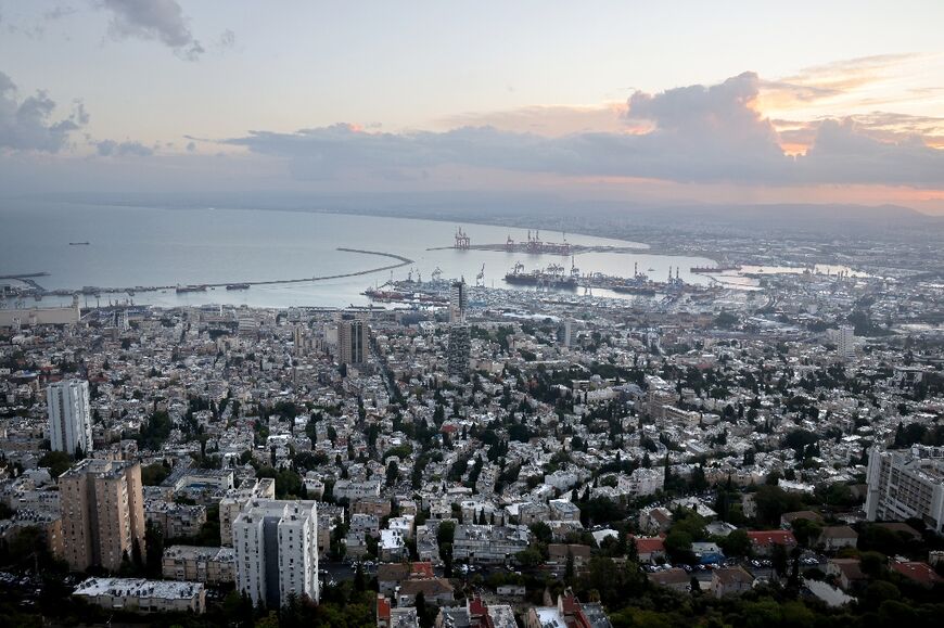 Streets in the Israeli port city of Haifa were largely deserted after Hezbollah rockets hit the city outskirts