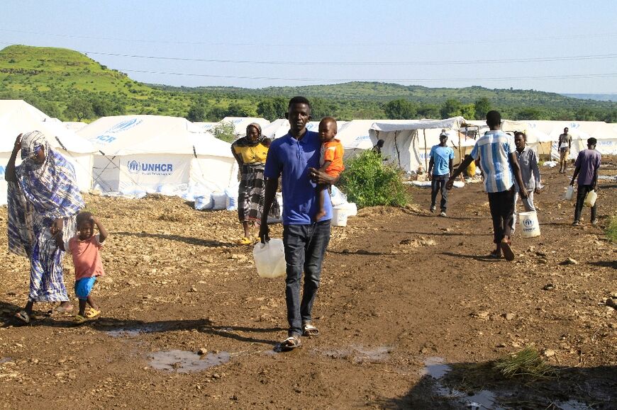 Displaced Sudanese, who have returned from Ethiopia, in a camp run by the United Nations Refugee Agency (UNHCR) in Sudan's border town of Gallabat -- more than 10 million have been uprooted by Sudan's war