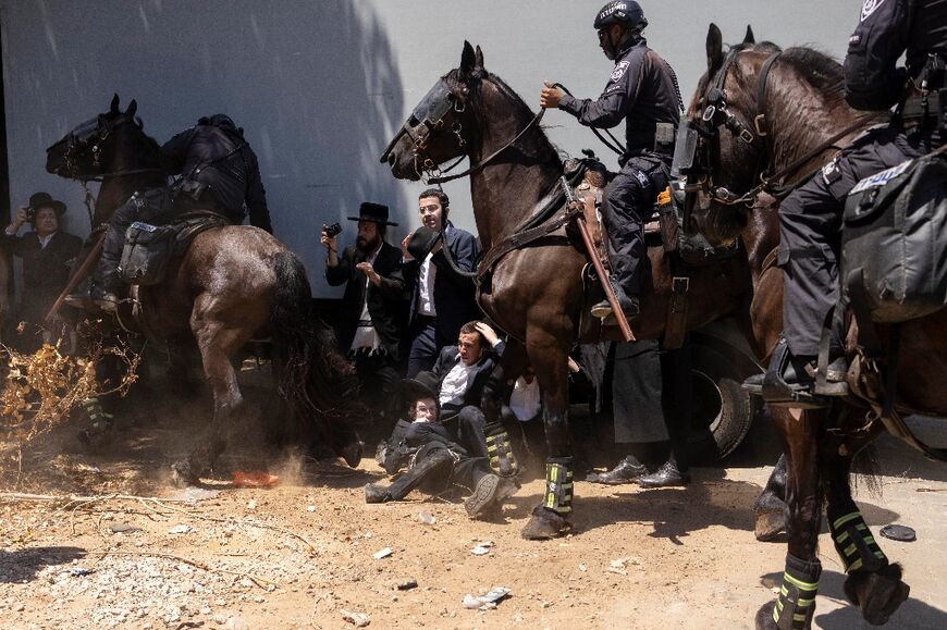 Ultra-Orthodox Jews protested outside military bases across Israel in August as the army started calling up young seminary students who would formerly have been exempted from military service