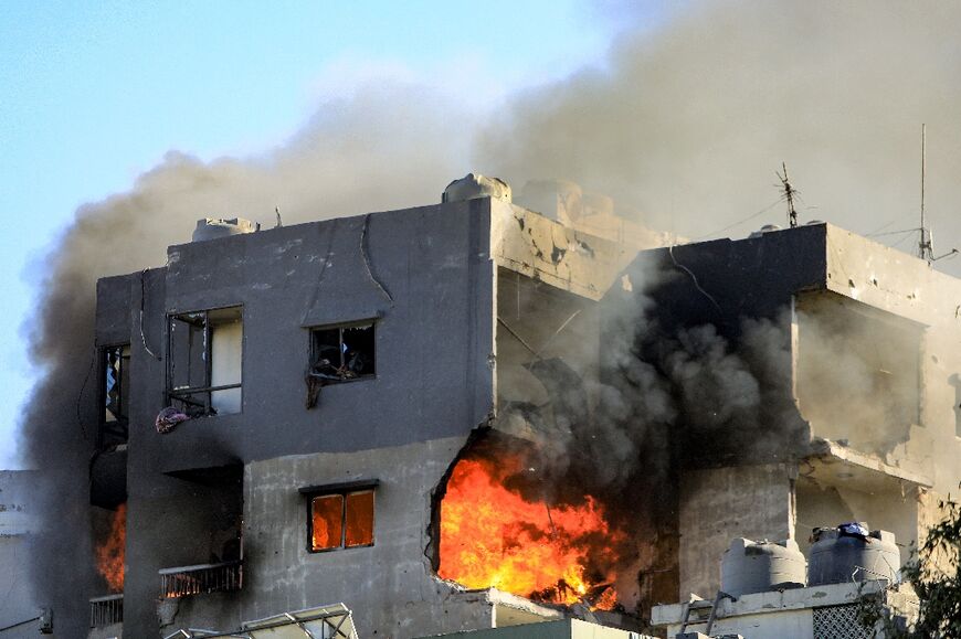 Fire burns in a building targeted by an Israeli air strike in Beirut's southern suburb of Shayah