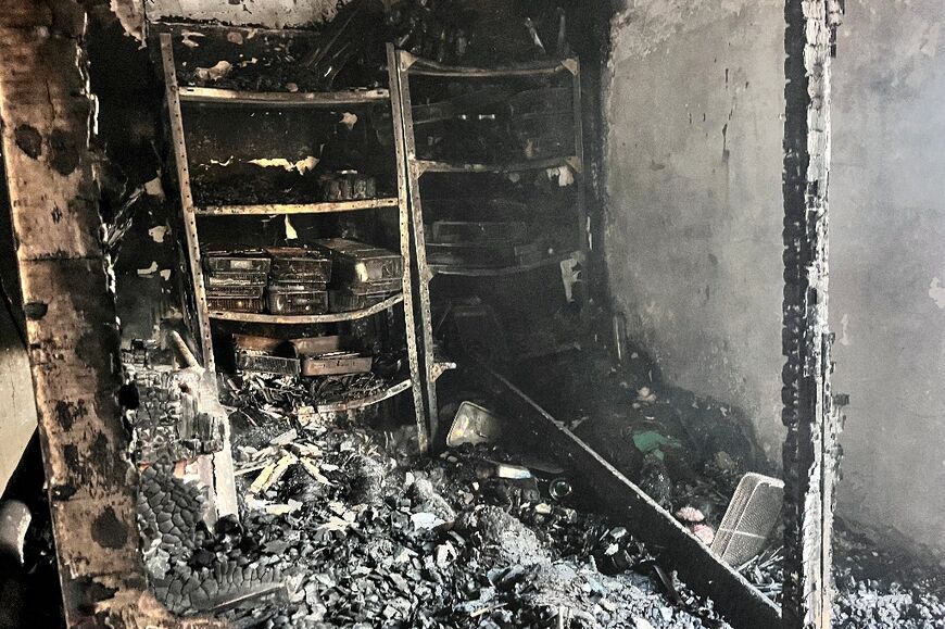 Burnt medical supplies in a storage room hit by an Israeli strike on Kamal Adwan hospital in Beit Lahia, northern Gaza 