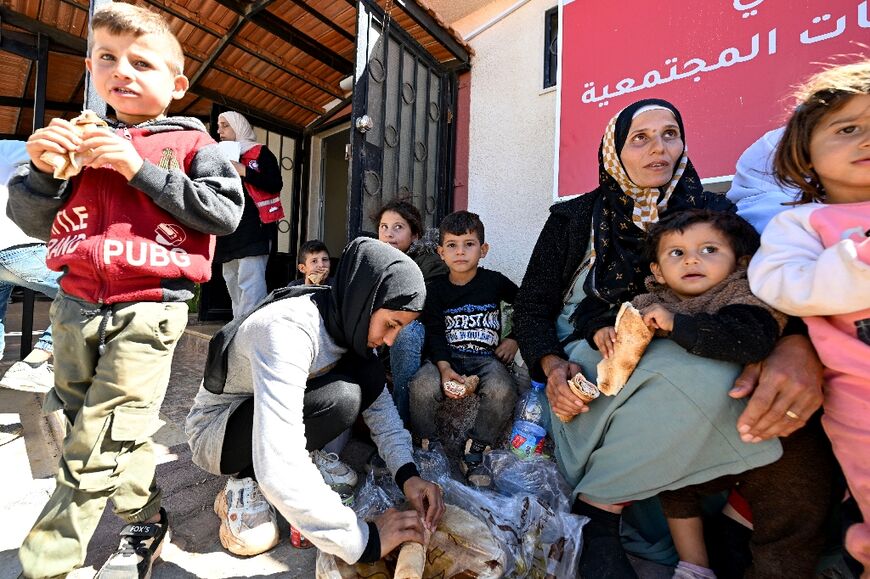 Tens of thousands more have fled to neighbouring Syria, still reeling from more than a decade of civil war