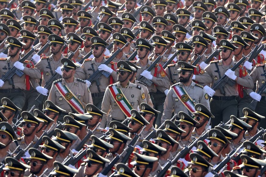 Soldiers march during Iran's annual parade marking the anniversary of the outbreak of the 1980-88 war with Saddam Hussein's Iraq