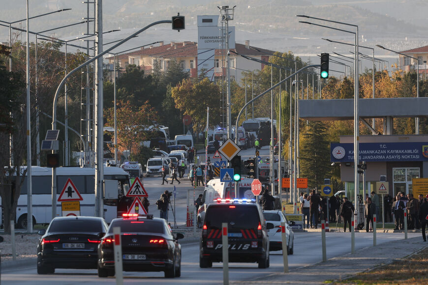 ANKARA, TURKEY - OCTOBER 23: Police vehicles enter the Turkish Aerospace Industries facility following an attack on October 23, 2024 in Ankara, Turkey. An attack occurred at the Turkish Aerospace Industries facility in Ankara, with preliminary reports suggesting two attackers detonated an explosive device and opened fire at the entrance gate of the facility. (Photo by Serdar Ozsoy/Getty Images)