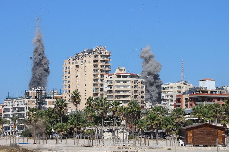 Plumes of smoke rise over the Lebanese coastal city of Tyre after Israeli air strikes