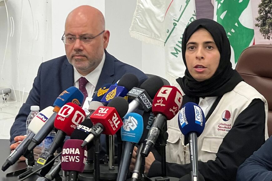 Lebanon's Health Minister Firass Abiad and Qatar's Minister of State for International Cooperation Lolwah bint Rashid al-Khater give a joint press conference in Beirut