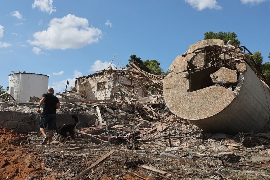 Rubble in a central Israeli city in the aftermath of the Iranian missile attack, Tehran's second-ever direct strike on its regional foe