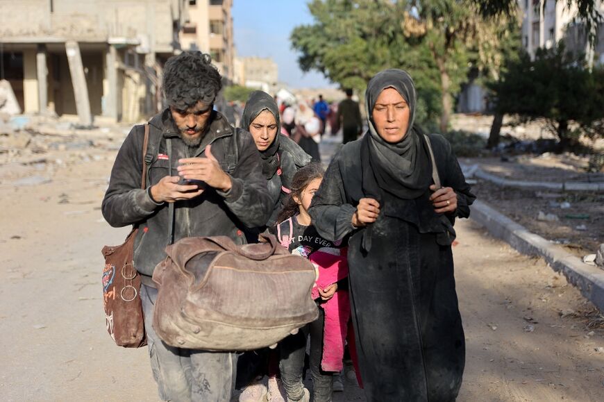 Displaced Palestinians fleeing Beit Lahia -- the UN says more than 100,000 have been displaced from north Gaza during intensified attacks and Israeli evacuation orders