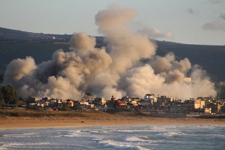 Smoke billows from the site of an Israeli airstrike that targeted the Palestinian refugees camp of Rashidiyeh near the southern Lebanese city of Tyre on November 26